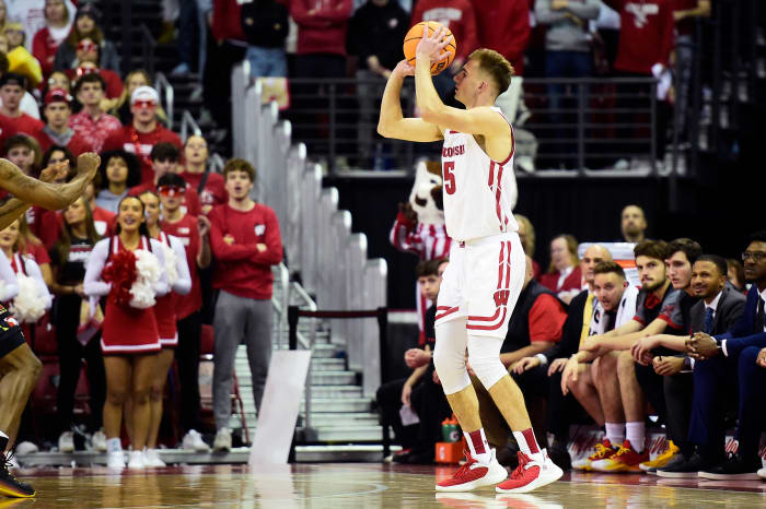 Wisconsin forward Tyler Wahl shooting a three-pointer against Maryland at the Kohl Center.